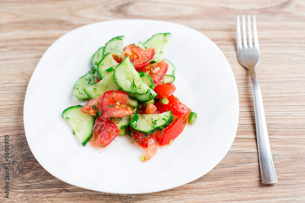 Tomato salad with cucumber and onion Tomato salad with cucumber and onion