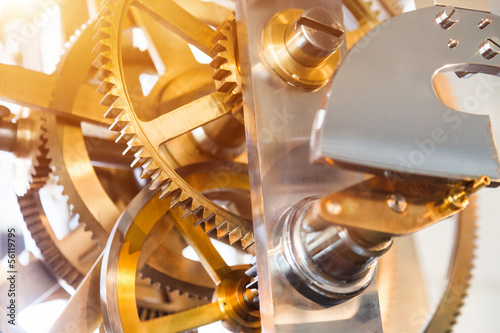 gears and mainspring in the mechanism of a pocket watch