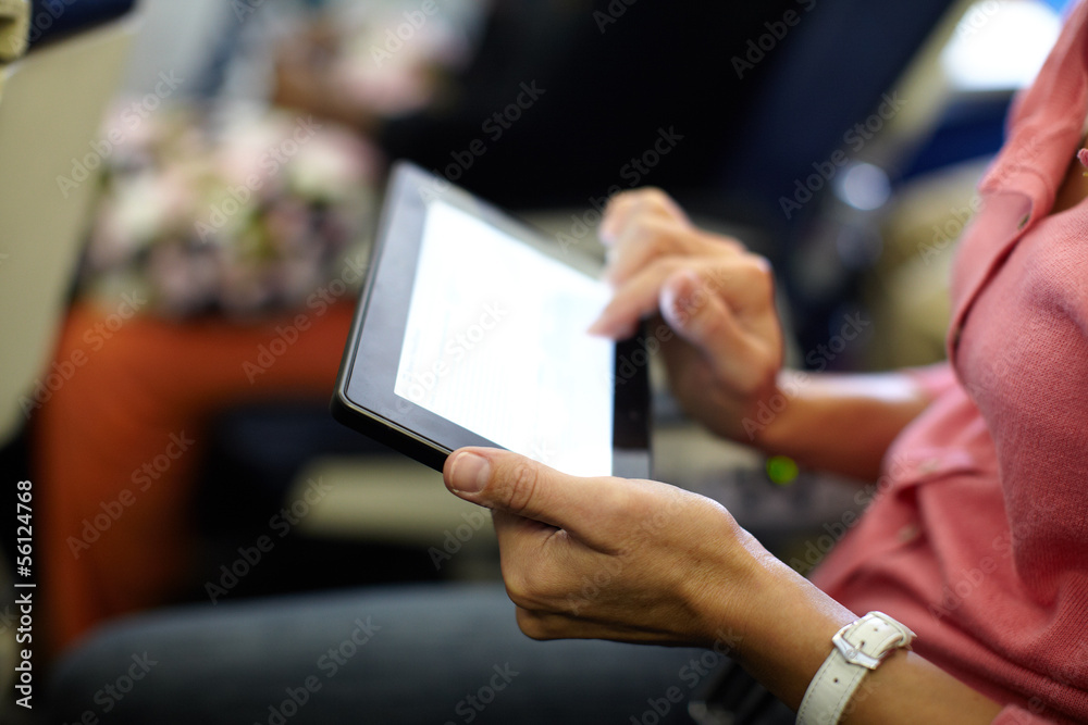 Hands with tablet computer.