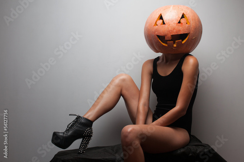 Fashionable halloweens model sitting