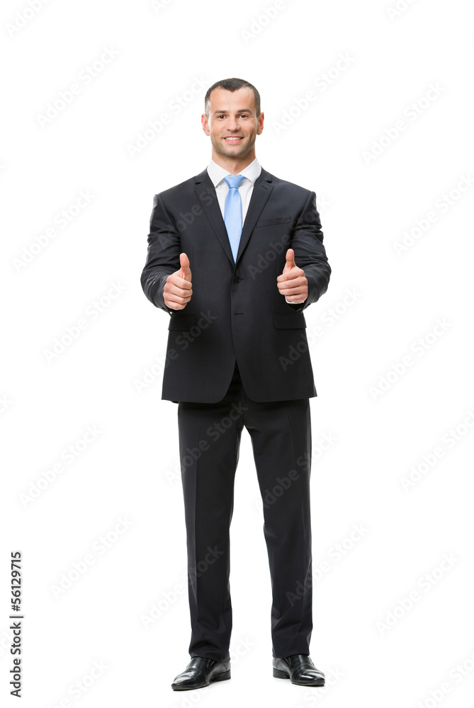 Full-length portrait of businessman who thumbs up Full-length portrait of businessman who thumbs up