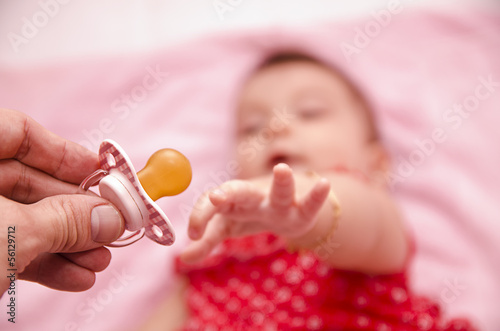 Bild auf Leinwand A pacifier for the baby
