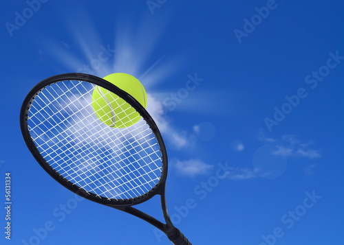 Tennis ball and racket in action
