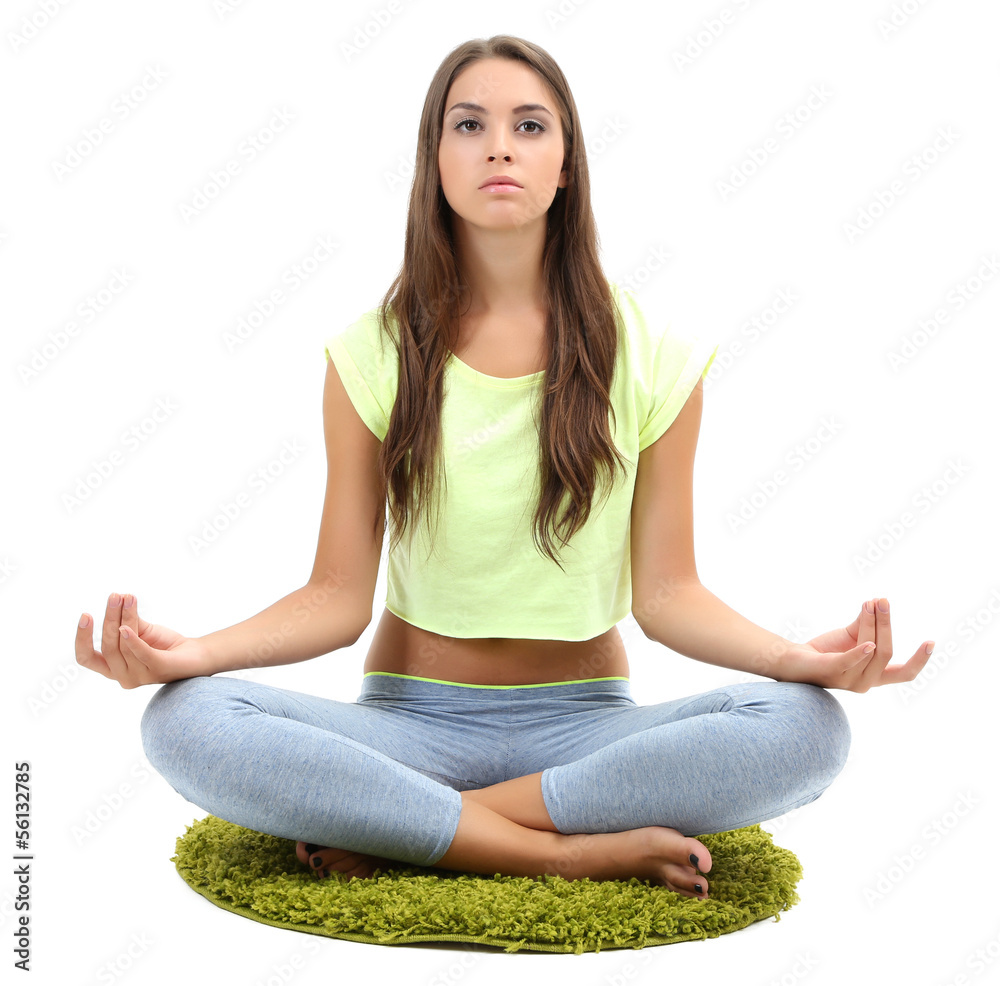 Young beautiful fitness girl doing yoga exercise isolated Young beautiful fitness girl doing yoga exercise isolated