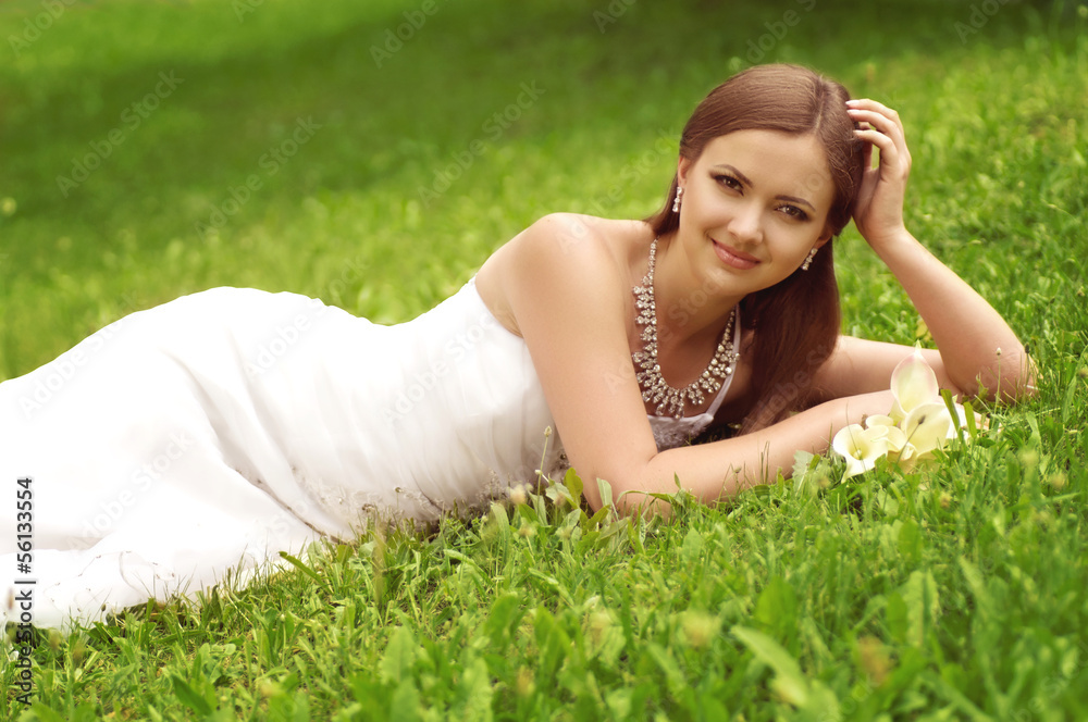 Beautiful bride with stylish make-up in white dress Beautiful bride with stylish make-up in white dress