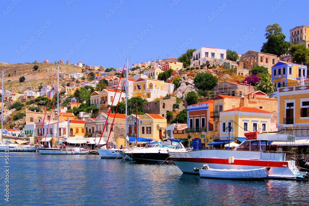 Colorful harbor with boats at Symi, Greece - obrazy, fototapety, plakaty 