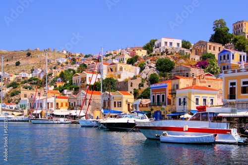 Colorful harbor with boats at Symi, Greece