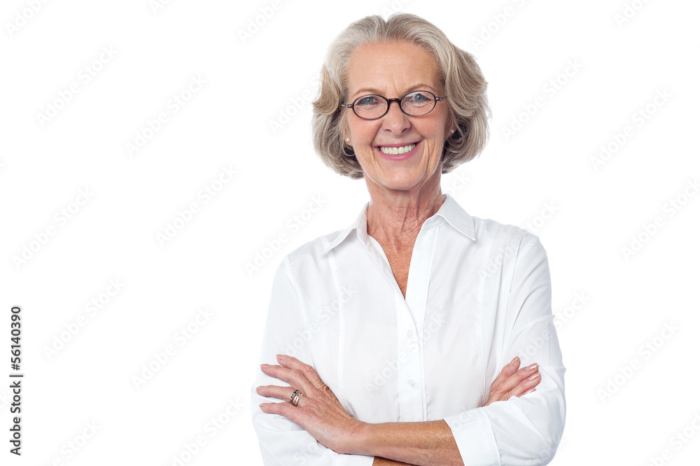 Portrait of smiling old lady, arms crossed. Portrait of smiling old lady, arms crossed.