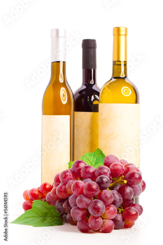 Bottle of red and white wine with grapes, white background