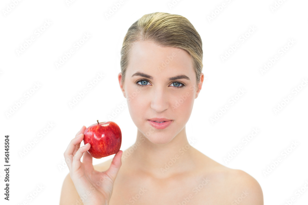 Attractive blonde holding red apple Attractive blonde holding red apple