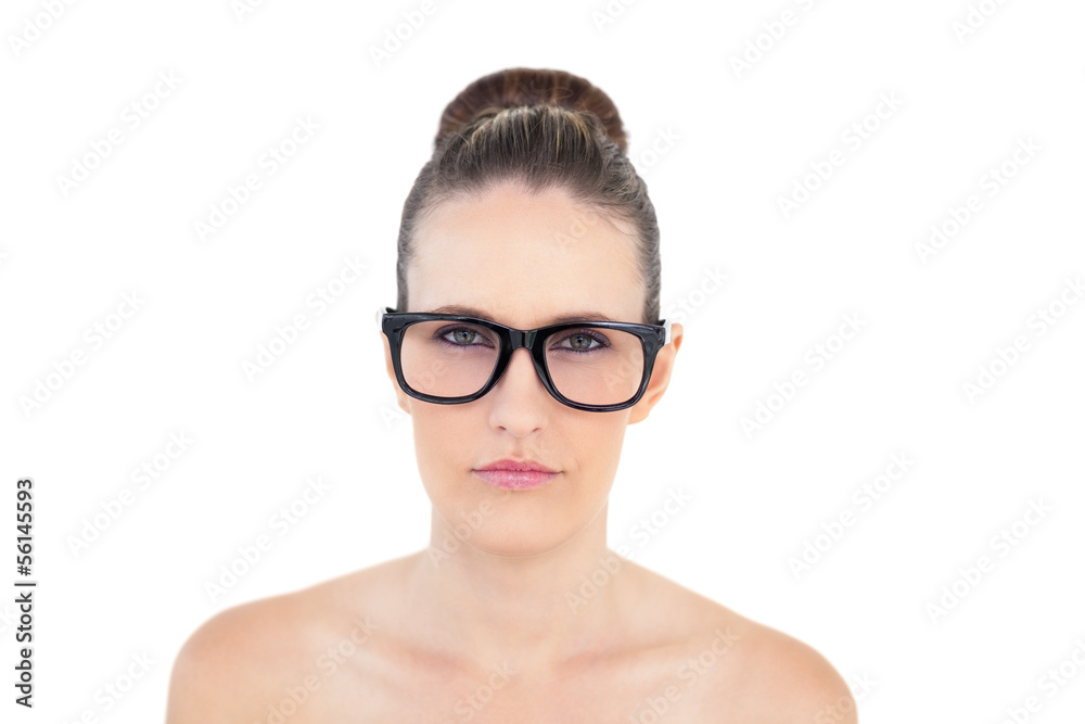 Serious woman wearing glasses looking at camera Serious woman wearing glasses looking at camera