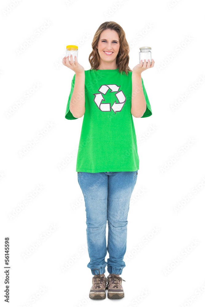 Attractive environmental activist holding pots Attractive environmental activist holding pots