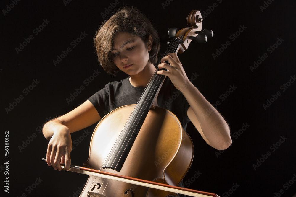 Young woman plays cello Young woman plays cello