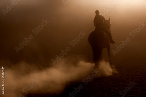 Horse riding in the dust