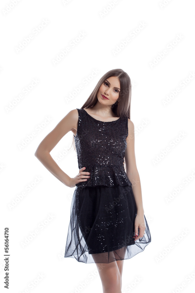 Smiling hot brunette posing in black smart dress Smiling hot brunette posing in black smart dress