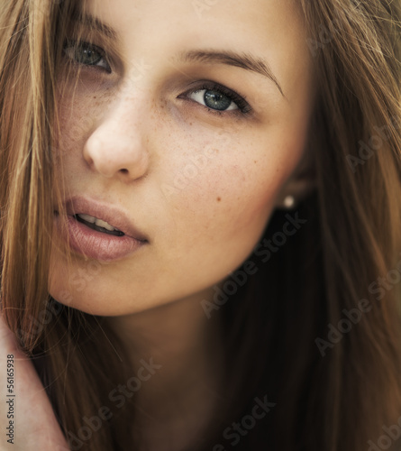 portrait of a beautiful brunette with clean face