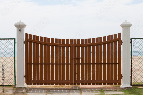 wooden gate with sea background
