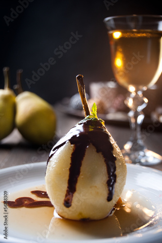 Delicious pear dessert with chocolate and amaretto liqueur