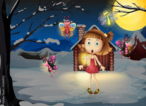 A young girl amazed by the butterflies
