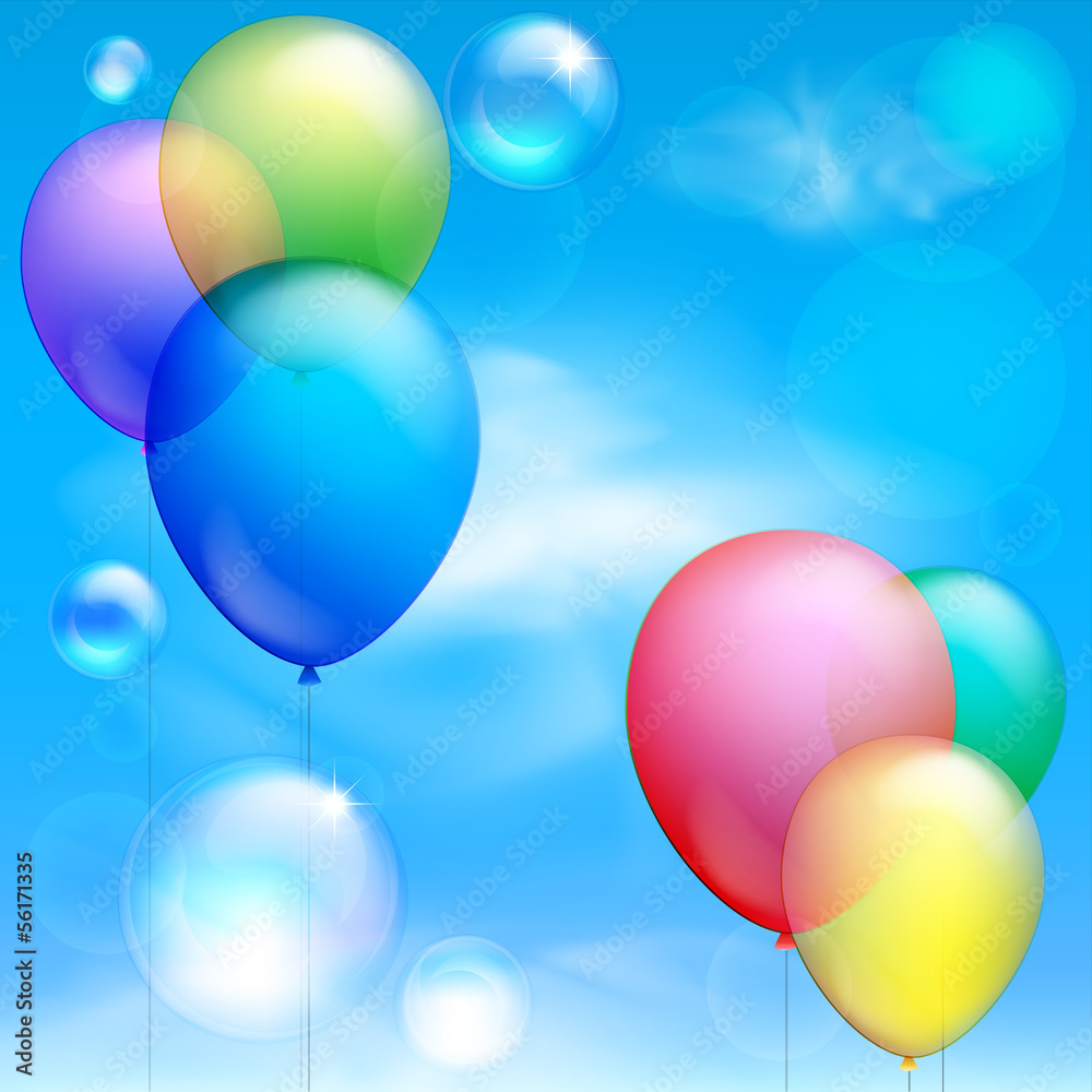 Festive balloons and bubbles against the blue sky and clouds