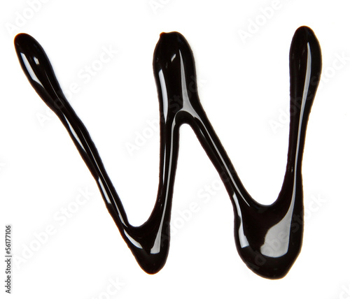 Small letter of alphabet made from chocolate syrup, isolated