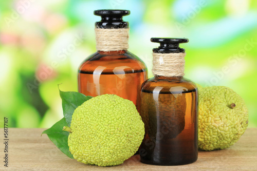 Osage Orange fruits (Maclura pomifera) and medicine bottles, photo