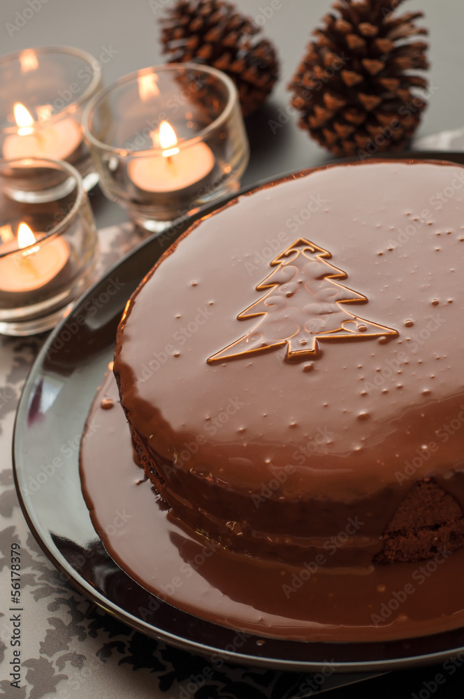 Sweet chocolate cakes setting for Christmas in dark tone. Sweet chocolate cakes setting for Christmas in dark tone.