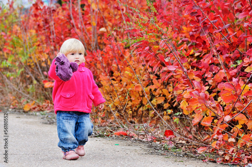 toddler walk along bushes
