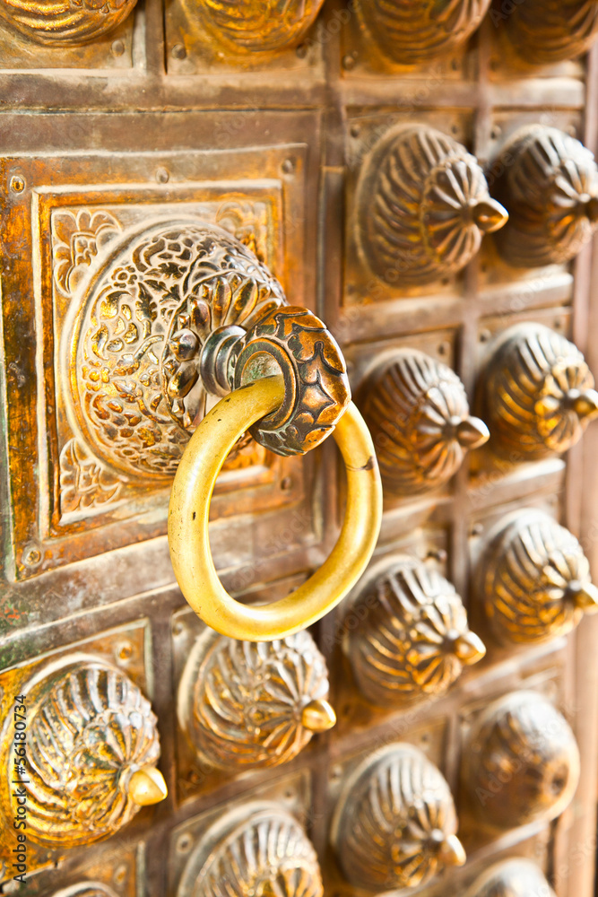 Bronze antique drawer door handle in Patan, Nepal. Bronze antique drawer door handle in Patan, Nepal.