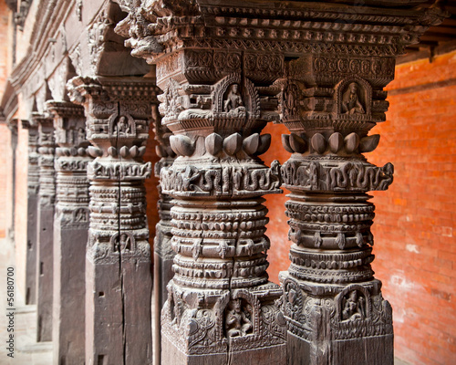 Carved wooden pillars on Mani Keshar Chowk in Patan, Nepal. photo