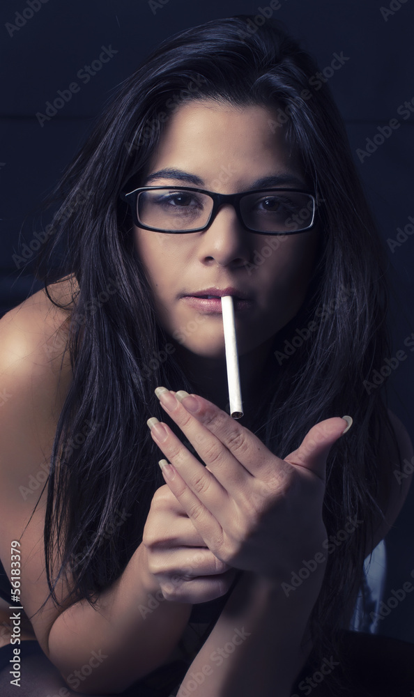 Sexy woman smoking cigarette Stock Photo | Adobe Stock
