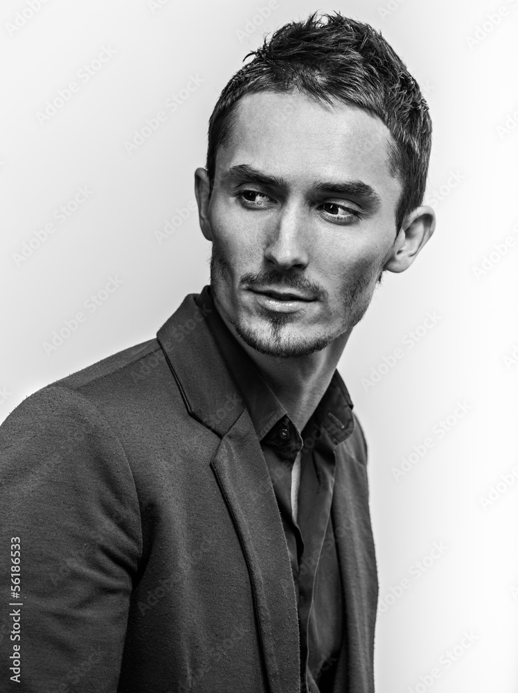 yong fashion man portrait on gray background yong fashion man portrait on gray background