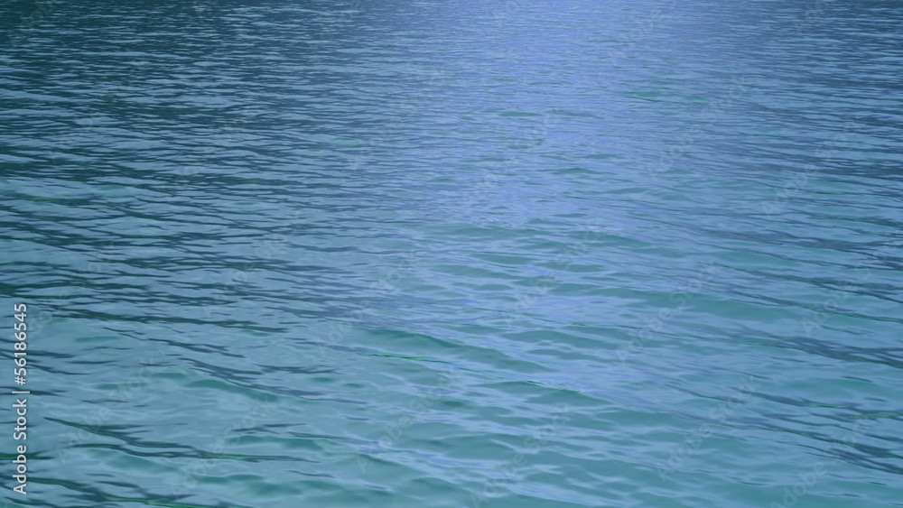Diagonal fly over a sea surface with gentle waves. high definition, 1080p, seamless loop. Great background for movie credits. Diagonal fly over a sea surface with gentle waves. high definition, 1080p, seamless loop. Great background for movie credits.