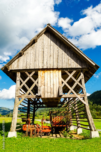 Typical old barn (double hayracks) in Slovenia photo