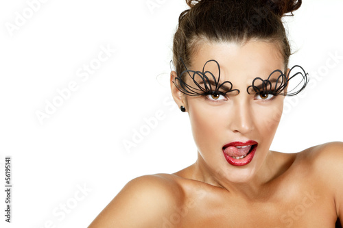sexy fashion girl with decorative eye lushes and red lipstick li photo