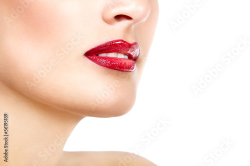 Beautiful lips of young fresh womanwith vivid red lipstick  face