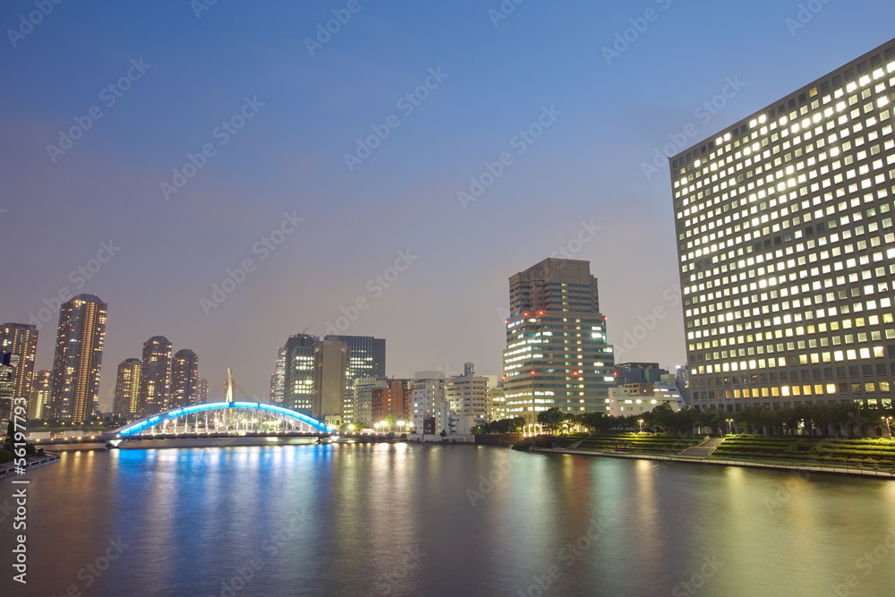 Obraz premium Tokyo skyline by night in modern Tsukishima district
