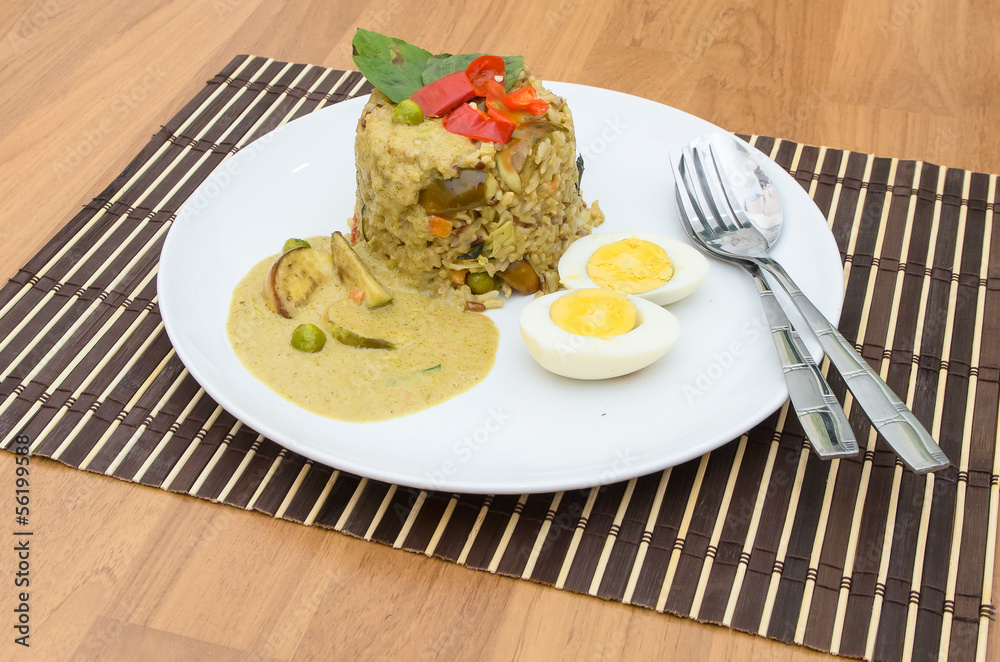 Fried rice green curry with pork and boil egg Fried rice green curry with pork and boil egg