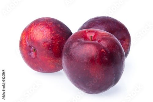 Plum. Ripe plum fruit on background