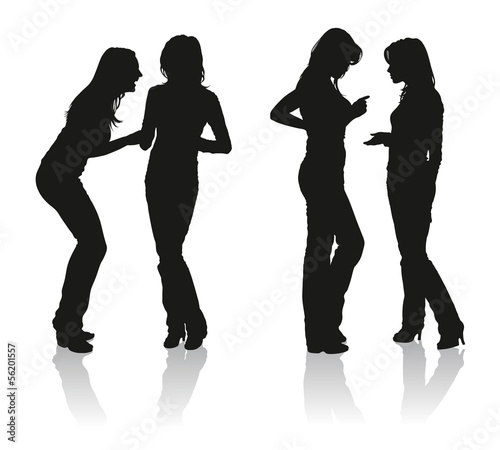 Silhouettes of two young women