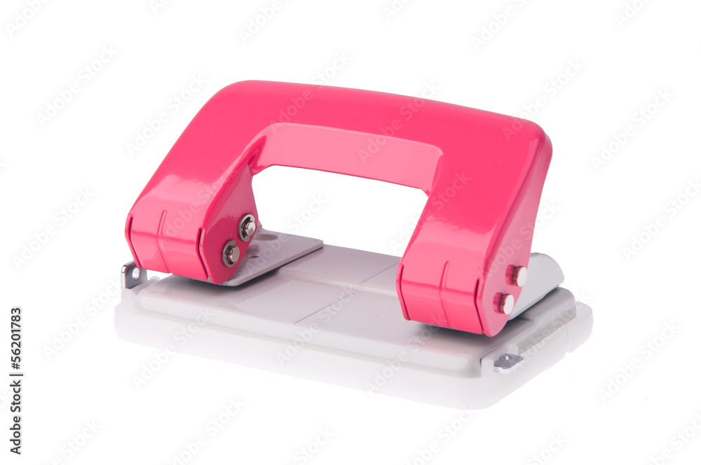 Office paper hole puncher on background Office paper hole puncher on background
