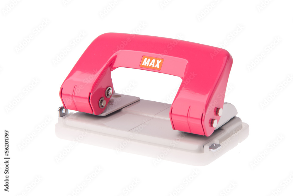 Office paper hole puncher on background Office paper hole puncher on background