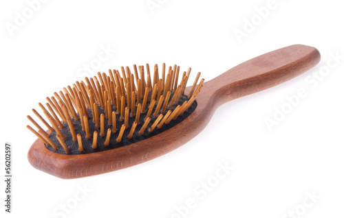 Wooden old comb on blackground