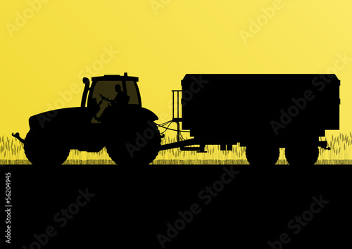 Agriculture tractor with corn trailer in cultivated country grai