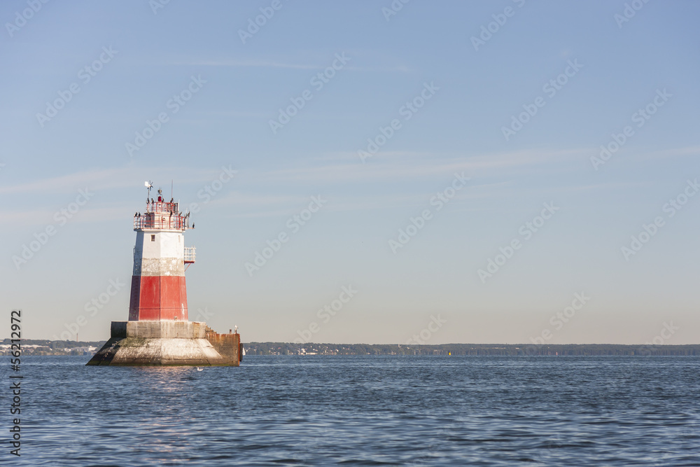 Big marine sign or lighthouse in sea