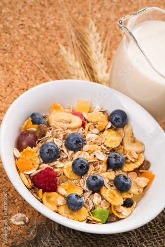 Muesli with pieces of fruit blueberries and raspberries