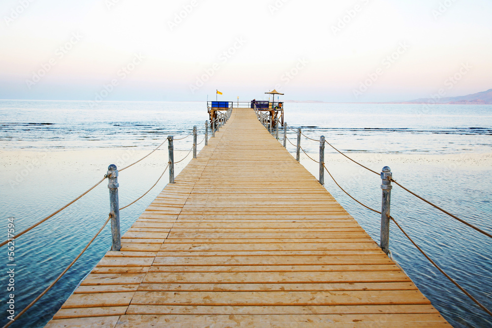 Fototapeta premium wooden platform beside sea