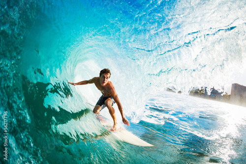 Canvas Print Surfer on Blue Ocean Wave in the Tube Getting Barreled