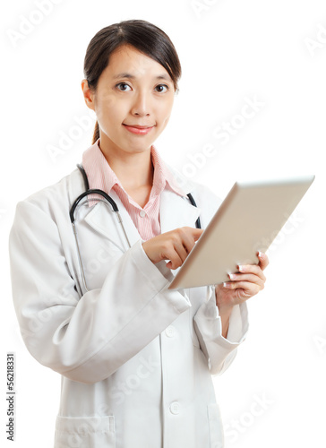 Asian female doctor with digital tablet