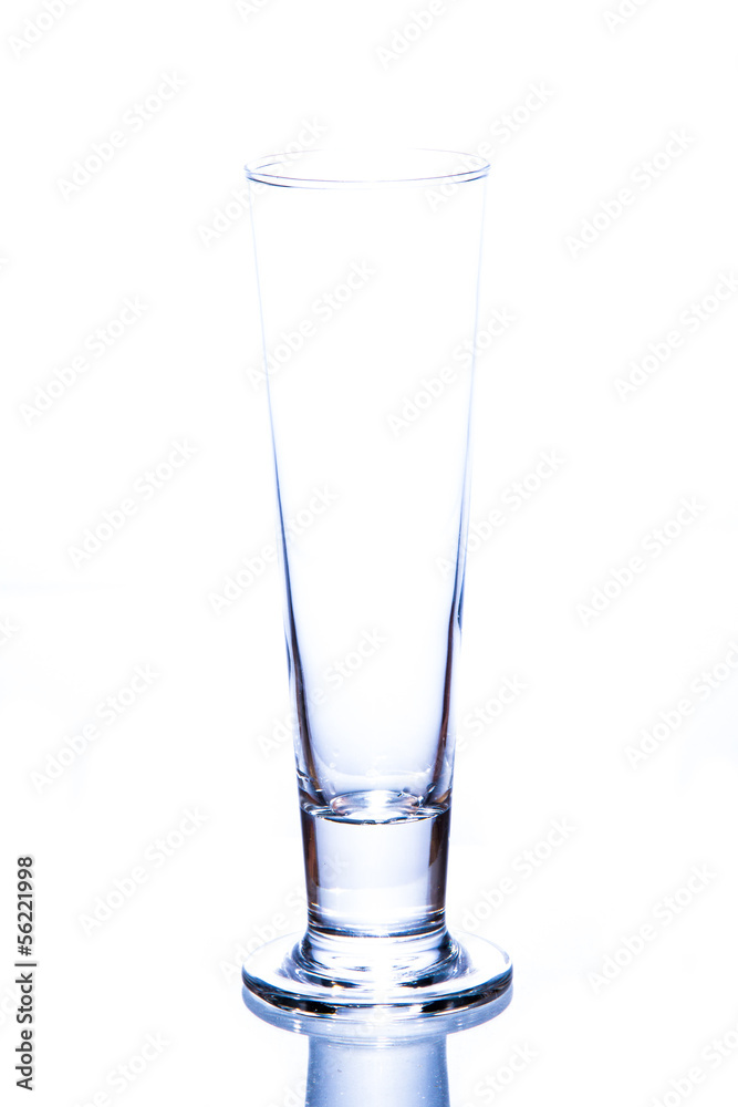 water pouring in a glass on white background. water pouring in a glass on white background.